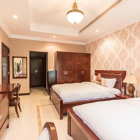 Yanjoon Holiday Homes - Palm Jumeirah Frond A Villas Dubai Esterno foto