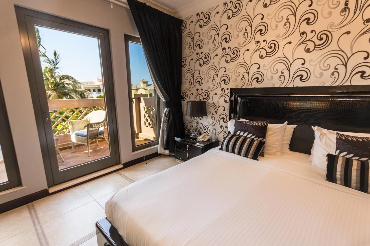 Yanjoon Holiday Homes - Palm Jumeirah Frond A Villas Dubai Esterno foto